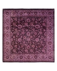 a purple rug with an intricate design on it