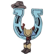 the letter u with a cowboy hat and boots on it