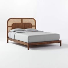 the bed is made up and ready for someone to use it in their home or office