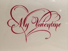 the word my valentine written in red ink