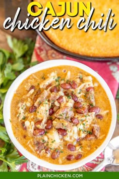 a bowl of cajun chicken chili next to a casserole dish