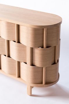 a wooden cabinet with several compartments on the top and bottom, made out of wood