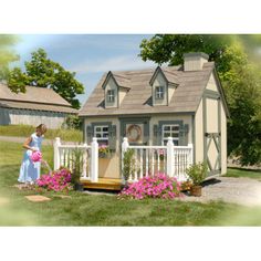 a woman standing in front of a small house