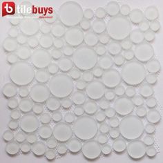 a white tile with circles on it