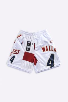 Unisex basketball shorts upcycled from a Ben Wallace NBA jersey and deadstock mesh. Featuring pockets and an elasticized waistband with drawstrings. Sourced and reworked in Canada   Product DetailsSize: Women's S, Men's XSCondition: Good vintage conditionColour: White, burgundy, gold Cotton Athletic Shorts For Basketball, Sporty Bottoms With Built-in Shorts For Basketball, White Athletic Shorts For Basketball Season, Vintage Basketball Shorts, White Shorts For Basketball, Basketball Bottoms With Built-in Shorts, Basketball Shorts With Built-in Shorts, White Athletic Shorts For Basketball In Summer, White Moisture-wicking Basketball Bottoms