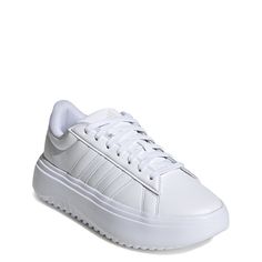 Elevate your shoe game with these womens Grand Court cloud white/cloud white/crystal white platform sneakers. Made of smooth synthetic upper, these athleisure sneakers have a round toe for classic styling and a secure lace-up closure. A Cloudfoam memory foam sockliner and Cloudfoam midsole offer pillow soft comfort while the EVA platform outsole provides lightweight cushioned strides and a boost of height. | Adidas Women's Grand Court Platform Sneaker in WhiteCrystal White Size 6. 5 Medium Shoes School, White Platform Sneakers, Athleisure Sneakers, Inside Shoes, Native Shoes, White Platform, White Cloud, Crystal White, Retro Sneakers