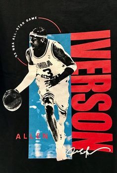 a black shirt with an image of a basketball player holding a ball in his right hand