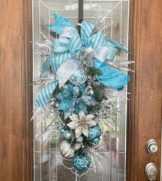 a door decorated with blue and silver ornaments