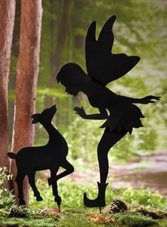 two silhouettes of tinkerbell and fawn in the woods, one standing on its hind legs