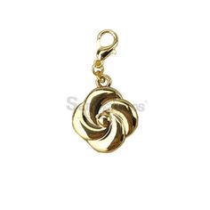 a gold plated charm with a spiral design on the front and back of it