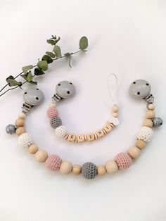 a necklace and earring made out of wood beads