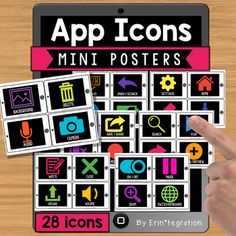 a person pointing at some stickers on top of a wooden table with the words app icons