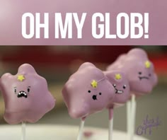 there are some little purple candies with yellow stars on them that say oh my glob