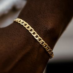 Introducing the Curb Chain Bracelet in 6mm! The same classic design with a bolder feel. This is the perfect piece to accentuate your fit, featuring 18k Yellow Gold links and our signature GLD clasp. Stack this with the Figaro Bracelet in Yellow Gold- 4mm for a dynamic duo. This product is guaranteed for life – GLD will repair or replace the item should you experience any defects in craftsmanship or breakage.    Specifications      - Width: 6mm      - Length: 6", 7", 8", & 9"      - Weight: (Weight can vary +/- 1 gram)               18k Yellow Gold Plated:                        -6": 8 grams                       -7": 8 grams                       -8": 9 grams                       -9": 12 grams Black Men Jewelry, Figaro Bracelet, Curb Chain Bracelet, Engraved Bracelet, Dynamic Duo, Vermeil Jewelry, Custom Earrings, Drop Necklace, Pendant Bracelet