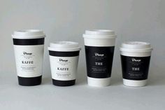 three different types of coffee cups sitting next to each other