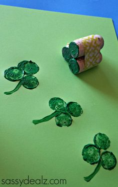 st patrick's day crafts for kids using toilet paper, shamrocks and corks