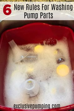 a red bucket filled with water and bubbles