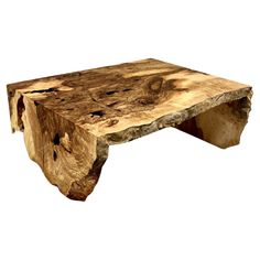 a table made out of wood with holes in it