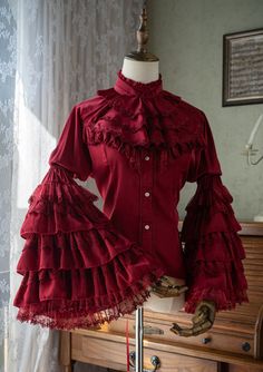 New Release: 【The Darkest Night】 #GothicLolita Blouse

◆ Shopping Link >>> https://lolitawardrobe.com/the-darkest-night-gothic-lolita-blouse_p8311.html Red Gothic Clothes, Red Ouji Fashion, Red Goth Clothes, Malewife Aesthetic, Victorian Vampire Outfit, Spider Aesthetic, Frilly Shirt, Victorian Shirt