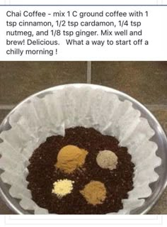 a cupcake in a paper plate on the ground with coffee grounds and powdered sugar