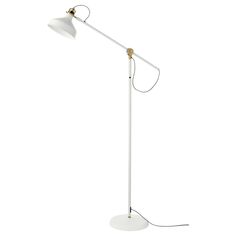 a white floor lamp with an adjustable arm and two lights on each side, in front of a white background