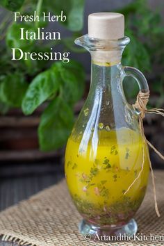 fresh herb italian dressing in a glass bottle