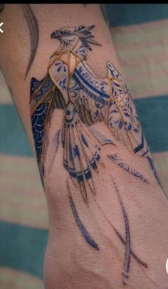 a person with a tattoo on their arm