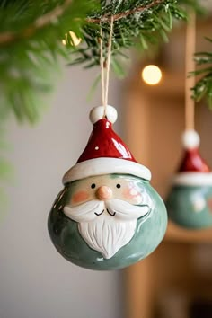 two ornaments hanging from a christmas tree