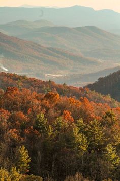 the mountains are covered in autumn foliage and there is no image on this page to describe