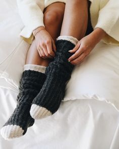 Irresistibly soft, undeniably cozy and absolutely darling—the Snow Bunny Slipper Socks are made for winter lounging. On cold, snowy days, these socks are a must and with non-slip grippers on the bottom, you have security to do anything you need around the house. Gift these to a friend, buy them for yourself, pair them with the matching Beanie, Gloves or Scarf and embrace your inner Snow Bunny. Cable Knit Socks, Bunny Slippers, Snow Bunny, Snow Bunnies, Cozy Socks, Winter Socks, Warm Socks, Snowy Day, Slipper Socks