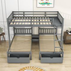 the bunk bed is made up and has two sets of drawers on each one side