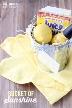 an easter basket with eggs and candy in it