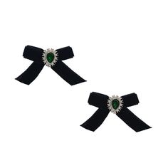 Step up your game with these daring Ribbon Bow Earrings. Crafted from luxurious velvet ribbon, they boast a striking black bow adorned with a dazzling emerald and crystal glass center. These bold stud earrings command attention, making you the center of attention.  2. 5" width x 3/4" length. Measurements may vary slightly per piece. Velvet Ribbon- synthetic  Zinc alloy pear shaped setting with glass stones July Birthstone Jewelry, August Birthstone Jewelry, Versatile Jewelry, Green Ribbon, Bow Earrings, Pearl Jewellery Earrings, Jewelry Ring Box, Men's Jewelry Rings, Evil Eye Jewelry