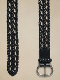 Woven luxury, this braided belt is made from sturdy leather for a classic and sleek addition to any waistline.  Width: 2. 25" (5. 7cm) Formal Woven Leather Belt, Formal Leather Rope Belt, Classic Braided Leather Belt, Classic Leather Rope Belt, Accessory Inspo, Braided Belt, Belt Black, Open Weave, Black Belt