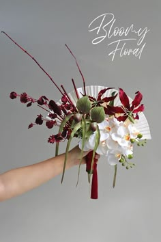 chinese wedding bouquet fan bouquet artificial flowers burgundy red chinese traditional fall wedding bridal bouquet Wedding Chinese Decoration, Chinese Floral Design, Asian Flower Bouquet, Chinese Wedding Bouquet, Long Bridal Bouquet, Vietnamese Wedding Decorations, Chinese Inspired Wedding, Red White Rose Bouquet