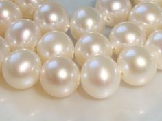 "Akoya look with lower cost. These pearls are very elegant and have the best classic look for bridal and high end jewelry, so beautiful,so lustrous! They are round just not perfect like glass pearls. Quality: AAA Color : Natural White (Ivory and Creamy) Luster: highest sheen and luster Nacre: lustrous and thick nacre Blemish: 95% - 99.9% Clear Shape :  Round (not prefect) Size: 6mm mm approx. Listing: 16\" strand  More Pearls: http://www.etsy.com/shop/TerraFinds?section_id=6629525 To view Gemstones: http://www.etsy.com/shop/TerraFinds?section_id=6656363 Thank you for shopping at Terra Finds. Please read shipping information before your purchase: www.etsy.com/shop/TerraFinds/policy" Healing Magic, High End Jewelry, Life Aesthetic, Fresh Water Pearls, Pearl Cream, Water Pearls, Spring Inspiration, Heishi Beads, Summer Dream