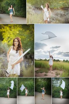 a woman holding a white kite while standing on a dirt road