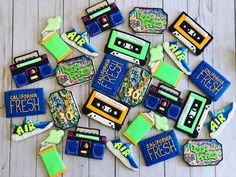 decorated cookies are arranged in the shape of cassettes