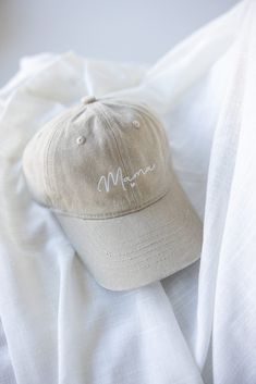 Beige MAMA Baseball Cap with Mama embroidered in white on the front, featuring an acid-washed design. Perfectly displayed on a soft white fabric, making it an ideal Mother's Day gift. Wash Baseball Cap, Mom Pride, Resort Collection, Your Mom, Spring Collection, Mother's Day Gift, Baseball Cap, Mother's Day Gifts, Mother's Day