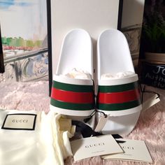 Gucci Web Lai Rubber Slide Sandal For Men, Available In Size 9 And 10. Brand New In A Box, Comes With Two Dustbag And Care Card. A Casual Rubber Slide Sandal With Our Web Detail. White Rubber With Green And Red Web Molded Rubber Footbed Rubber Sole Flat Made In Italy Msrp $695 Classic White Slides With Round Toe, Classic White Flat Sandals, Luxury White Leather Slides, Gucci Designer Slip-on Slides, Designer Gucci Slip-on Slides, Designer White Leather Slides, Luxury White Slip-on Sandals, White Gucci Slip-on Slides, Luxury White Gucci Sandals