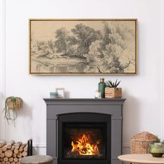 a living room with a fire place in the center and paintings on the wall above it