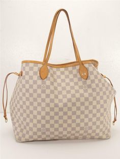 Louis Vuitton Tote From the 2011 Collection Blue / Cream Coated Canvas Damier Azur Pattern Brass Hardware Leather Trim Dual Shoulder Straps Leather Trim Embellishment Canvas Lining & Single Interior Pocket Clasp Closure at Top Date Code: FL1191 Shoulder Strap Drop: 8.5" Height: 12.75" Width: 21.5" laying flat at widest, and 15" from seam to seam at bottom. Depth: 8" LOUIS VUITTON LV Coated Canvas Damier Azur Neverfull GM Tote Bag Handbag 2011 Louis Vuitton Tote From the 2011 Collection Blue / Cr Elegant Satchel With Dust Bag For Errands, Damier Azur Neverfull, Designer Leather Bags, Louis Vuitton Tote, Cream Coat, Neverfull Gm, Louis Vuitton Totes, Couture Designers, Leather Bags