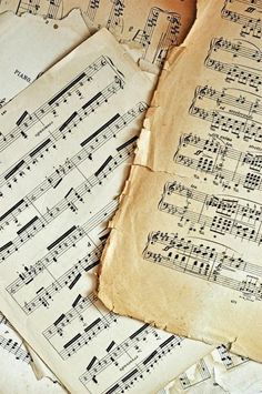 old sheet music sheets with musical notations on them