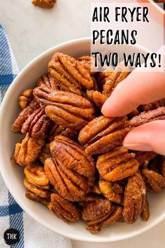 pecans in a bowl with text overlay that says air fryer pecans two ways