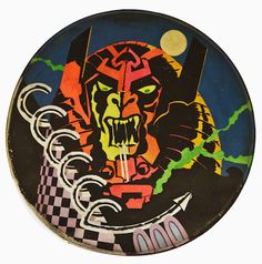 a plate with an image of a demon on it