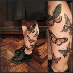 the legs are covered with butterflies on them