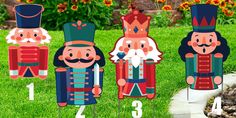 paper cutouts of nutcrackers are in the grass