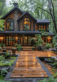 a large wooden house surrounded by trees and plants