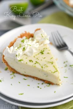 a slice of key lime pie on a white plate