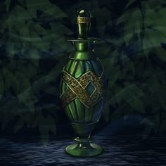 a green vase sitting on top of a table next to a dark background with leaves